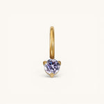 Nadare Co. mini birthstone charm featuring a round lavender gemstone set in polished gold on a small hoop.