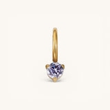 Nadare Co. mini birthstone charm featuring a round lavender gemstone set in polished gold on a small hoop.