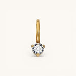 Nadare Co. mini birthstone charm featuring a round brilliant-cut white gemstone set in polished yellow gold.