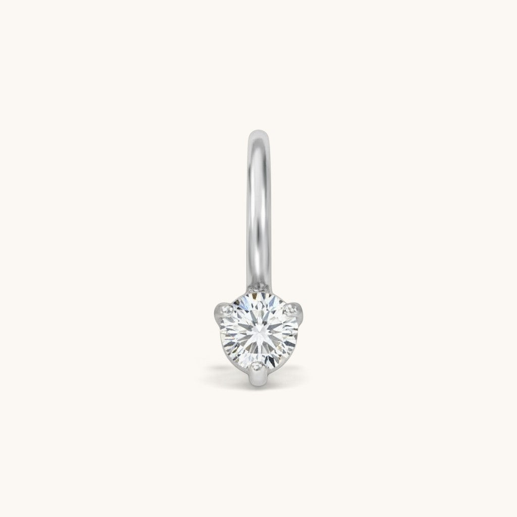 Nadare Co. mini birthstone charm in silver-tone stainless steel with a sparkling round cubic zirconia stone