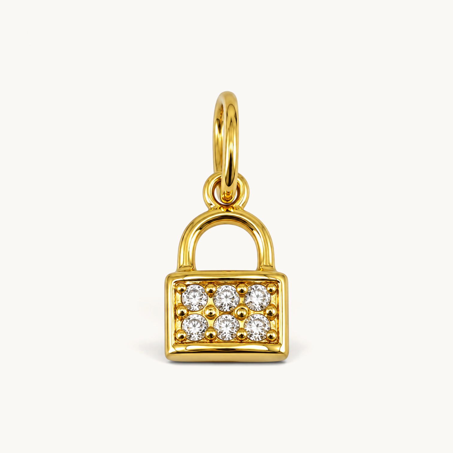Nadare Co. mini padlock charm in 14k gold plated stainless steel with shimmering cubic zirconia pavé stones.