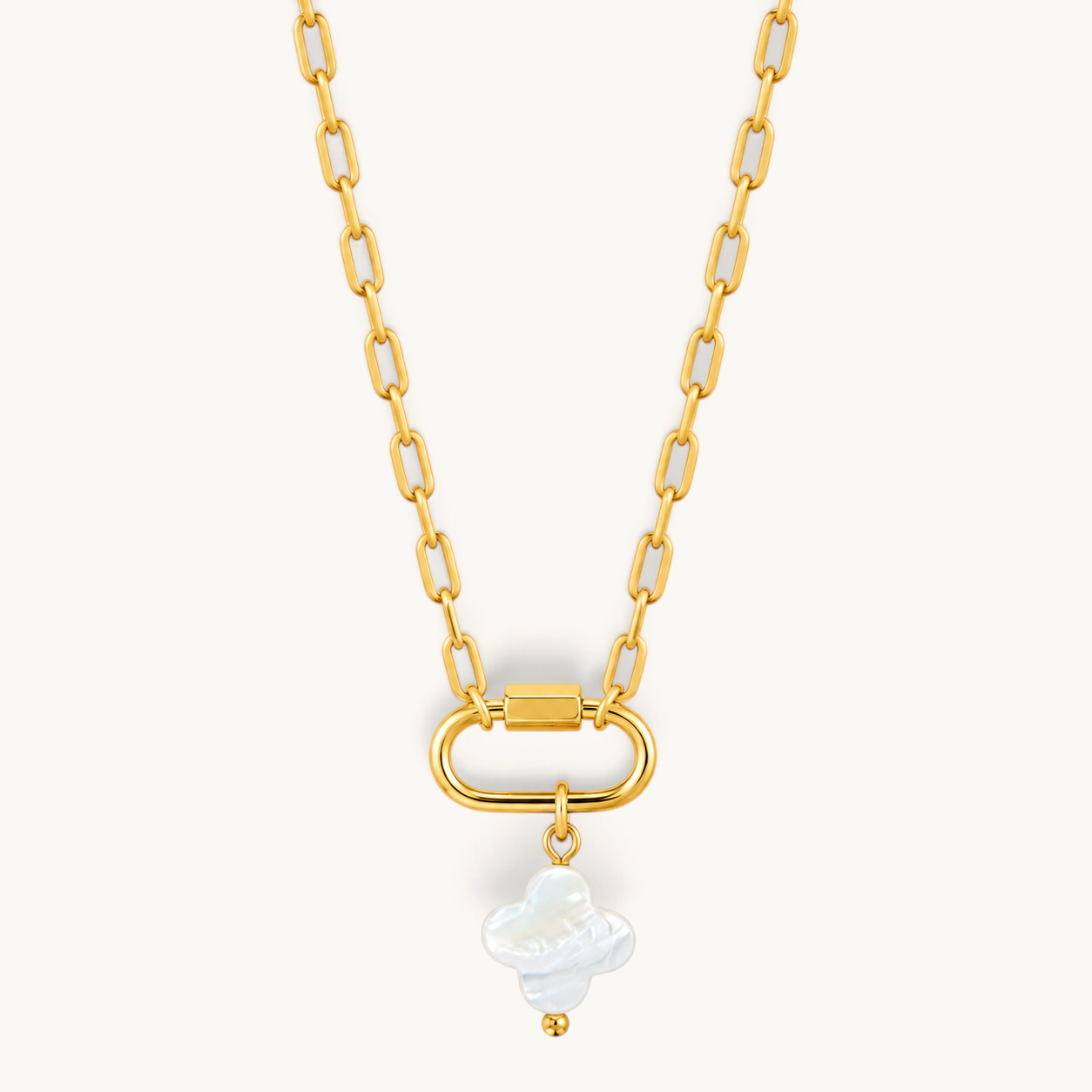 Nadare Co. gold plated stainless steel chain necklace featuring a white mother of pearl clover charm pendant.