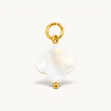 Nadare Co. clover charm featuring white mother of pearl inlay with 14k gold plated stainless steel hardware.