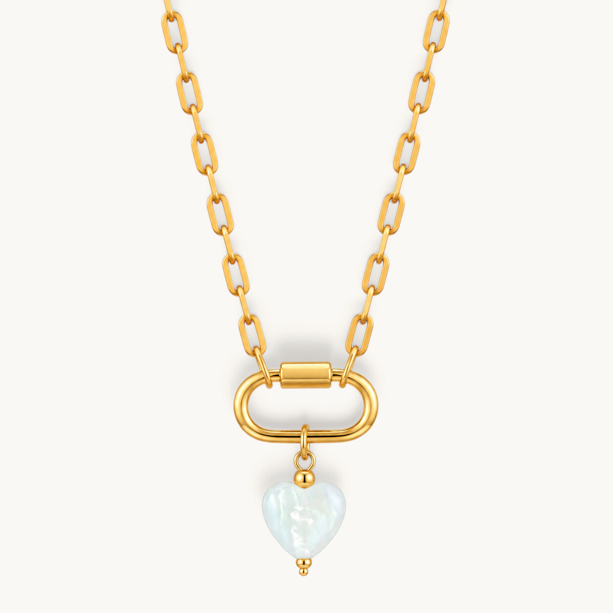 Nadare Co. Mother of Pearl heart charm on a gold-plated stainless steel chain with a carabiner clasp