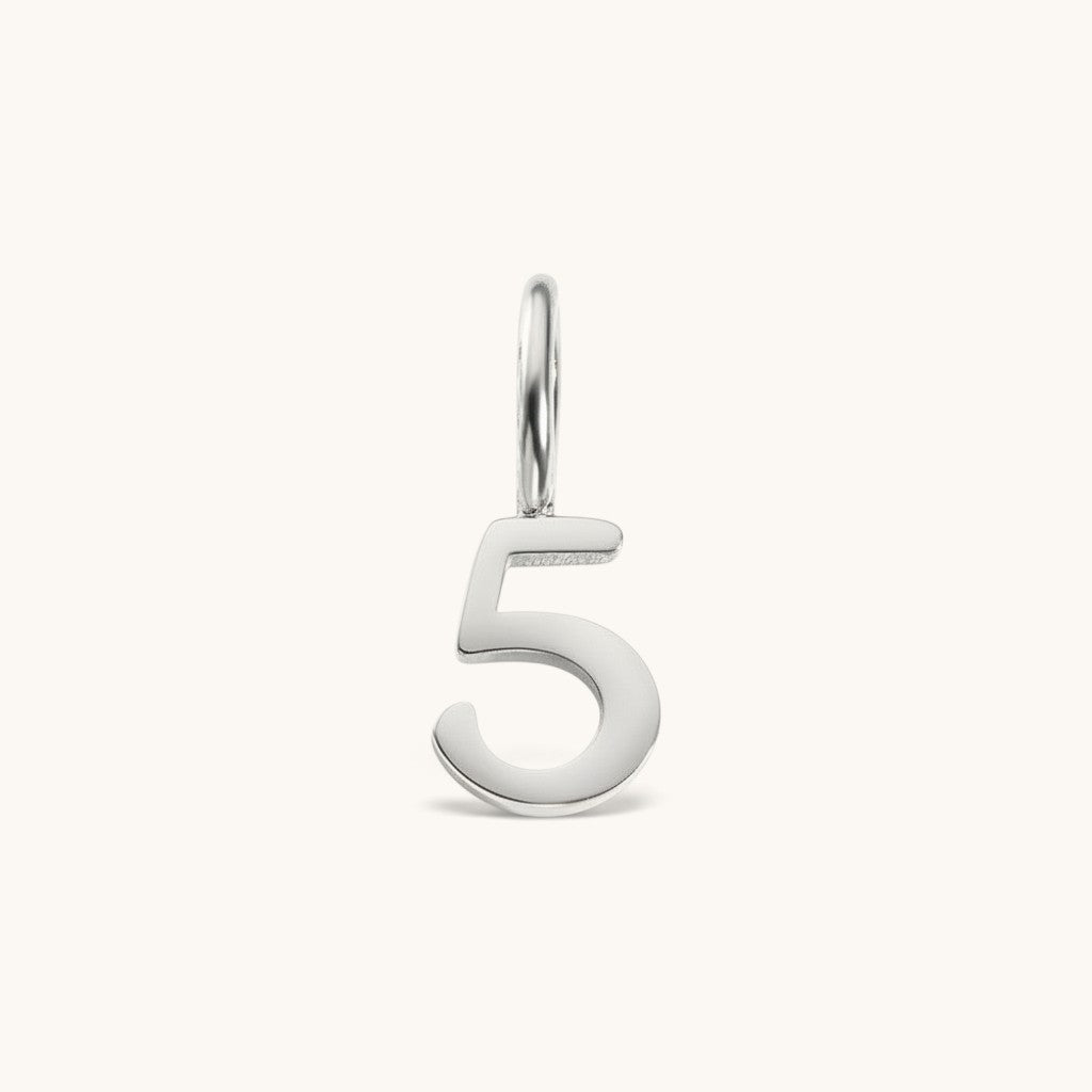 Nadare Co. silver-toned number 5 charm made from stainless steel for minimal everyday jewelry layering