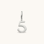 Nadare Co. silver-toned number 5 charm made from stainless steel for minimal everyday jewelry layering