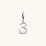 Nadare Co. number three charm in polished silver-tone stainless steel for minimalist jewelry layering