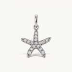 Nadare Co. silver-tone starfish charm featuring sparkling cubic zirconia pavé stones for a beach-inspired look.