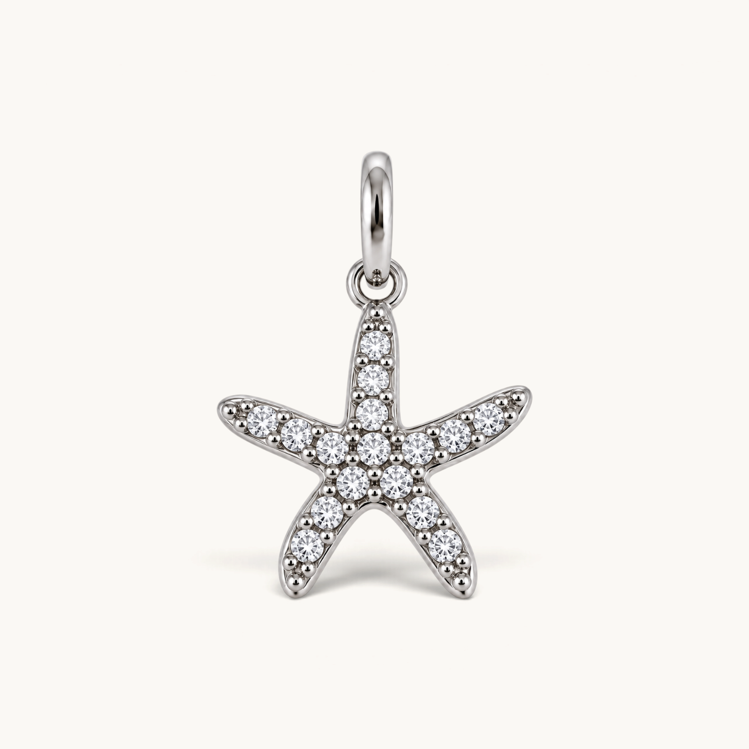 Nadare Co. silver-tone starfish charm featuring sparkling cubic zirconia pavé stones for a beach-inspired look.