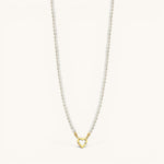 Nadare Co. Classic Pearl Chain featuring round imitation pearls and a gold-tone heart-shaped charm clasp.