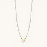 Nadare Co. Classic Pearl Chain featuring round imitation pearls and a gold-tone heart-shaped charm clasp.