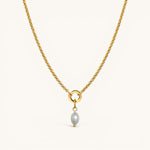 Nadare Co. Pearl Charm necklace featuring a delicate gold chain with a single lustrous grey pearl pendant.