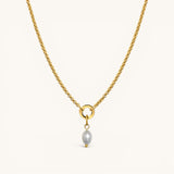 Nadare Co. Pearl Charm necklace featuring a delicate gold chain with a single lustrous grey pearl pendant.