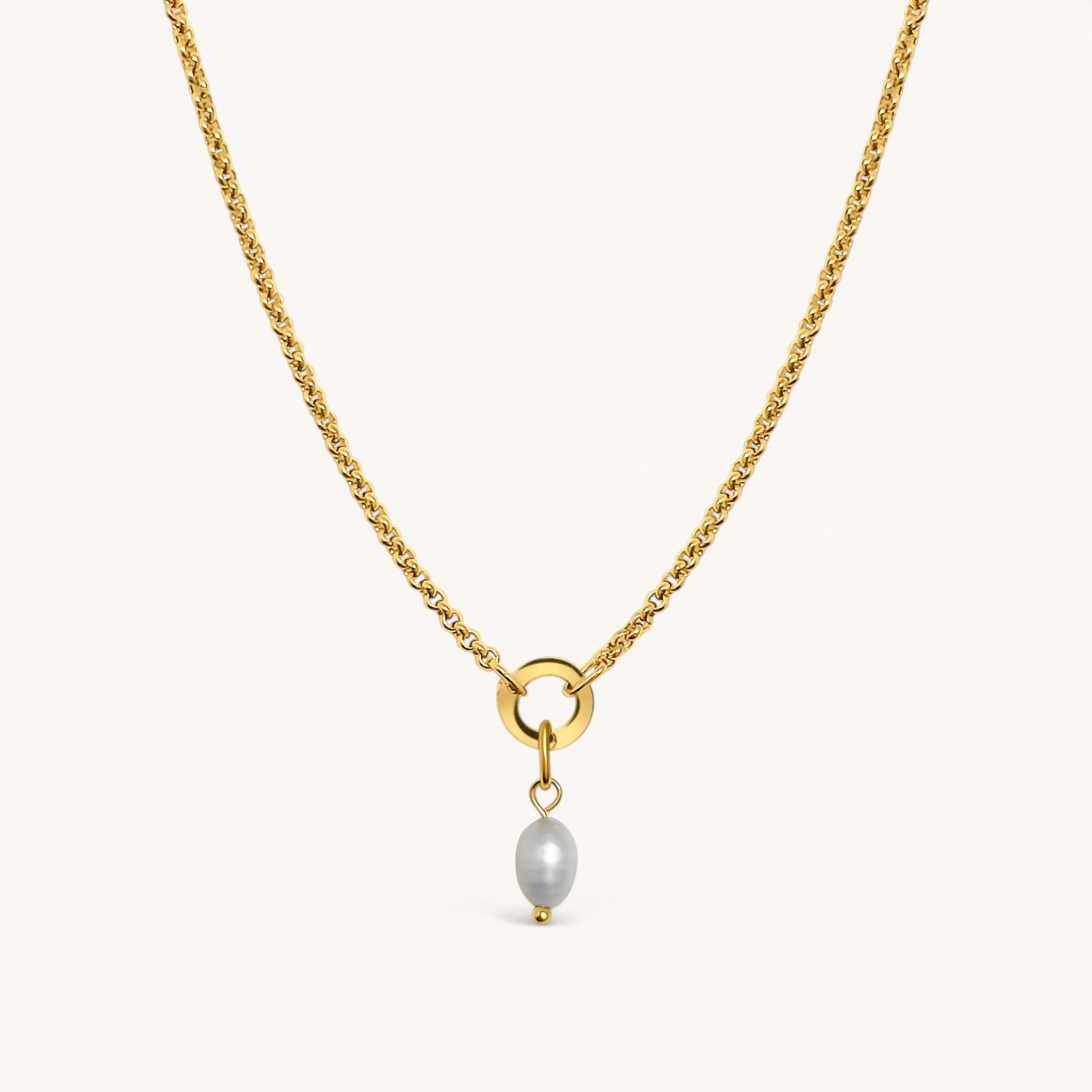 Nadare Co. Pearl Charm necklace featuring a delicate gold chain with a single lustrous grey pearl pendant.
