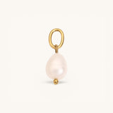 Nadare Co. Pearl Charm featuring an organic freshwater pearl with 14k gold-plated stainless steel hardware.
