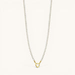 Nadare Co. Classic Pearl Chain featuring round imitation pearls and a gold heart-shaped charm clasp