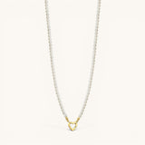 Nadare Co. Classic Pearl Chain featuring round imitation pearls and a gold heart-shaped charm clasp