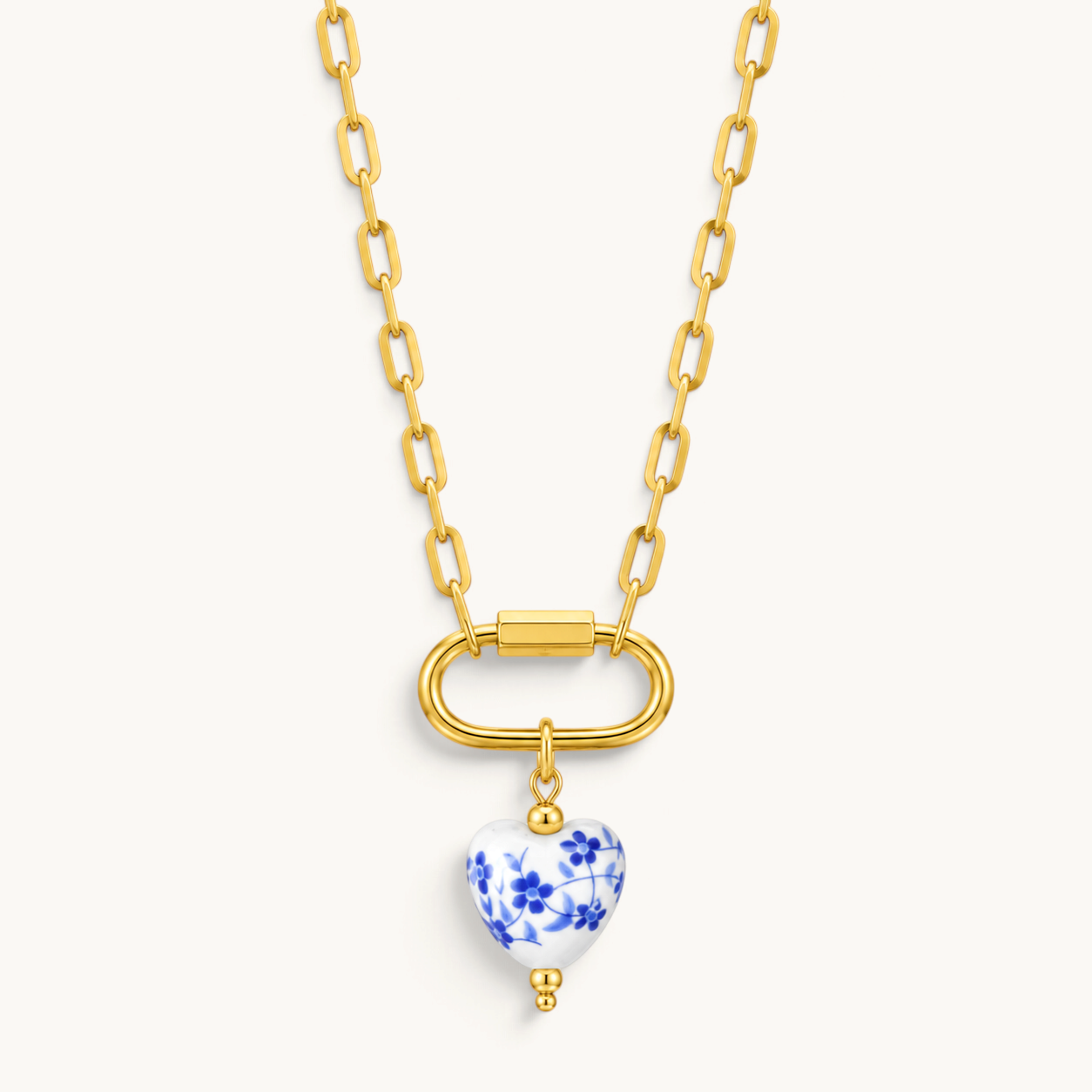 Nadare Co. porcelain heart charm necklace with blue floral pattern and 14k gold plated stainless steel chain
