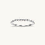 Nadare Co. Prism Birthstone Ring featuring a delicate silver band with a row of sparkling clear stones