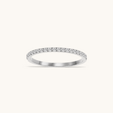 Nadare Co. Prism Birthstone Ring featuring a delicate silver band with a row of sparkling clear stones