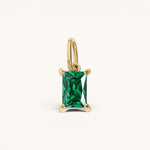 Nadare Co. rectangle birthstone charm featuring a vibrant green emerald-cut gemstone set in polished yellow gold.