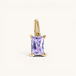Nadare Co. rectangle birthstone charm featuring a light purple gemstone set in polished gold on a small jump ring.
