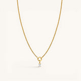 Nadare Co. gold chain necklace featuring a delicate rectangular birthstone charm on a circular pendant loop.