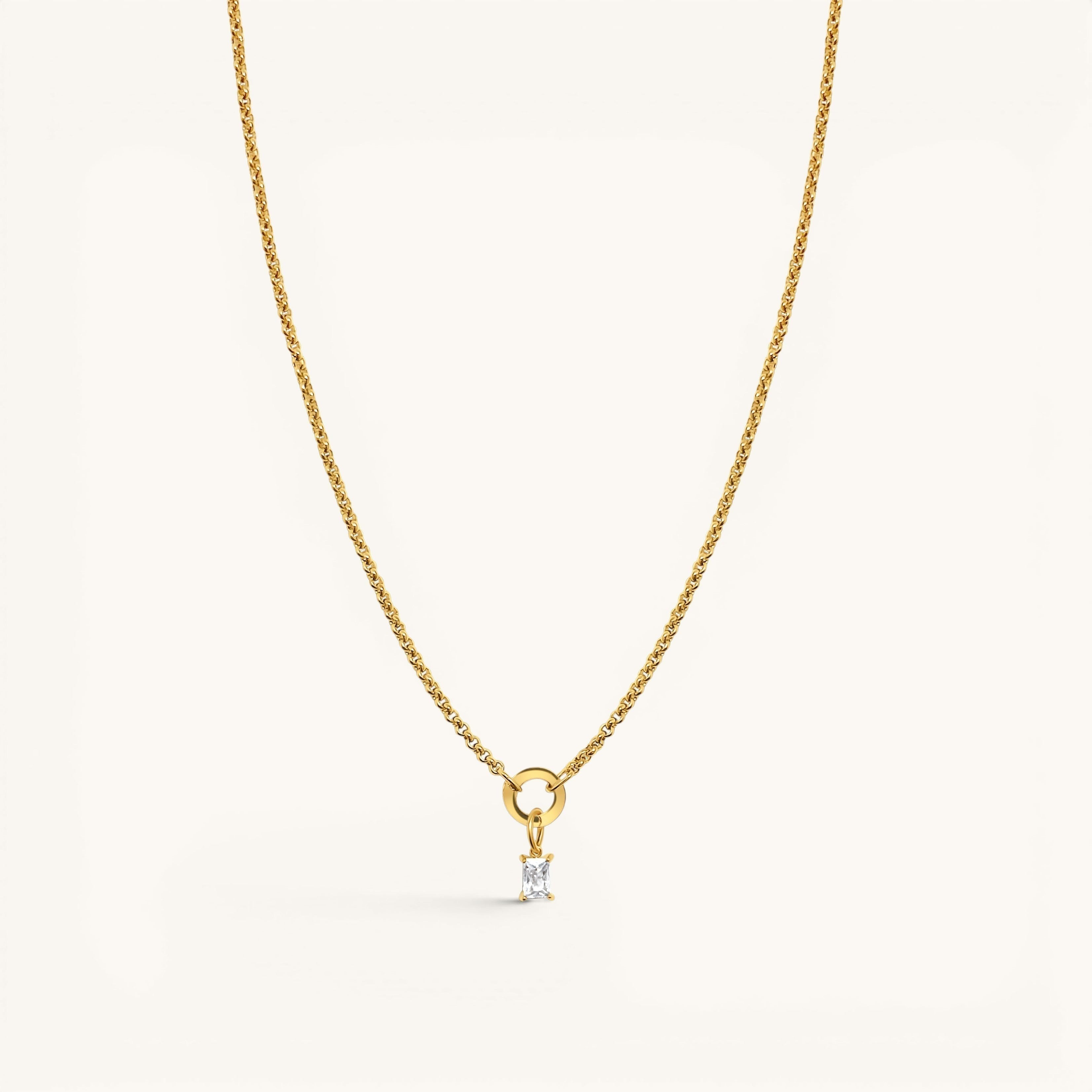 Nadare Co. gold chain necklace featuring a delicate rectangular birthstone charm on a circular pendant loop.