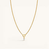 Nadare Co. gold chain necklace featuring a delicate rectangular birthstone charm on a circular pendant loop.