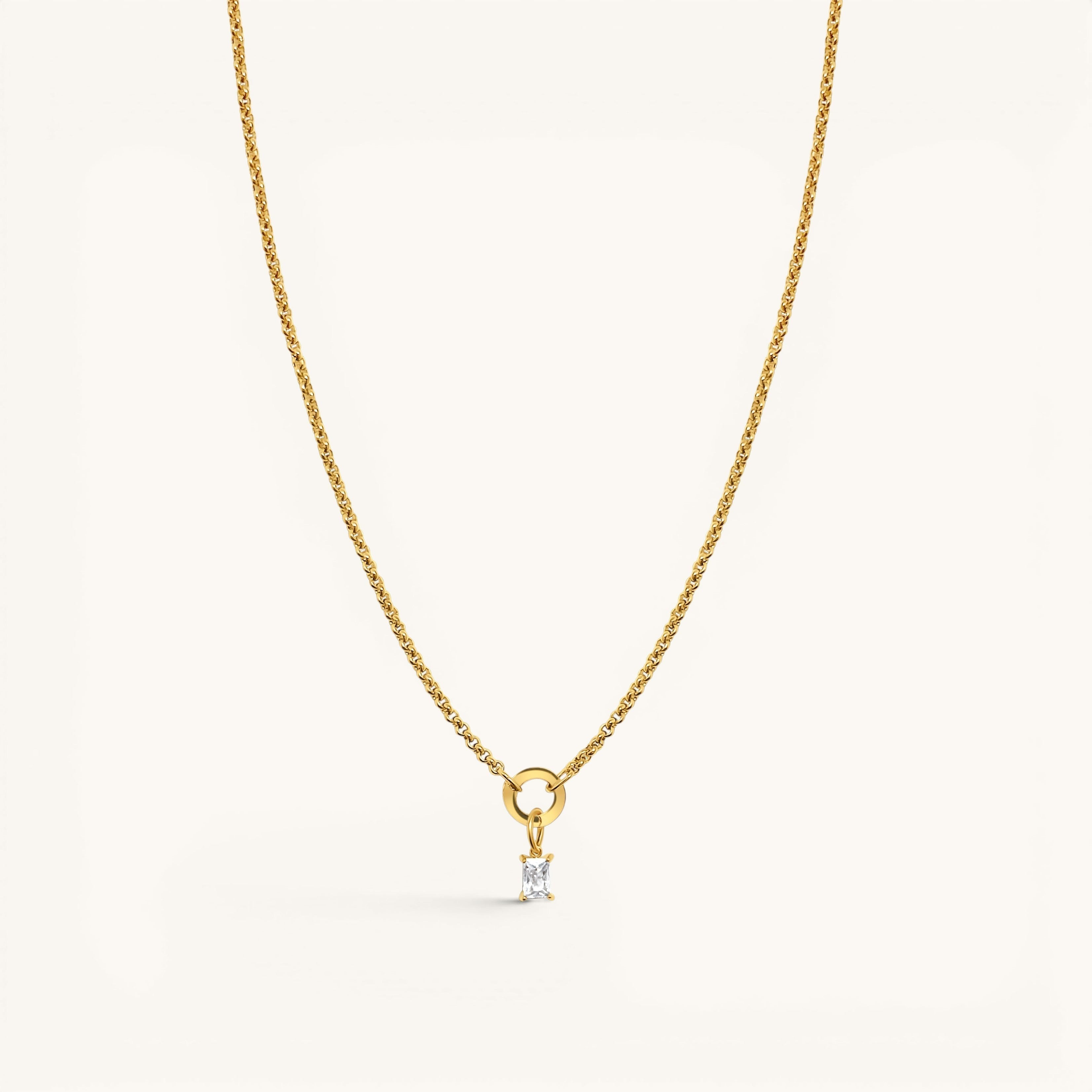 Nadare Co. gold chain necklace featuring a delicate rectangular birthstone charm on a circular pendant loop.