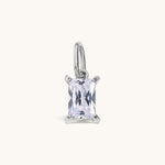 Nadare Co. rectangle birthstone charm in silver-tone stainless steel with a clear cubic zirconia stone