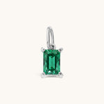 Nadare Co. rectangle birthstone charm featuring a vibrant green emerald-cut cubic zirconia in a silver-tone setting.