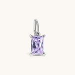 Nadare Co. rectangle birthstone charm featuring a light purple cubic zirconia stone in a silver-tone setting.