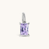 Nadare Co. rectangle birthstone charm featuring a light purple cubic zirconia stone in a silver-tone setting.