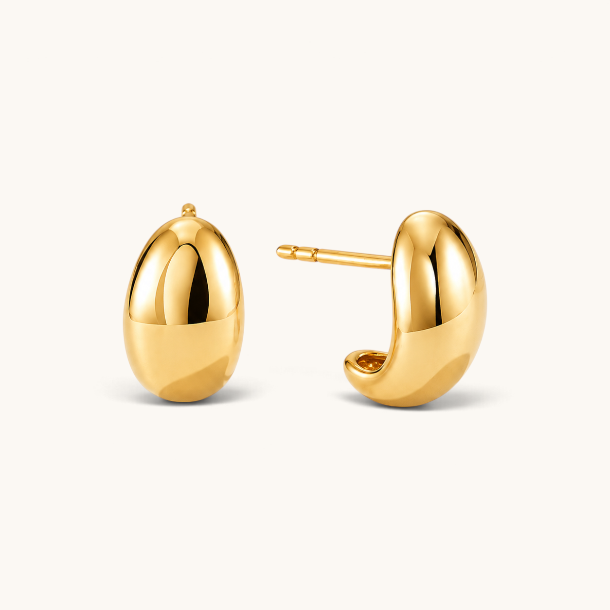Nadare Co. Remi Earrings featuring a chunky, sculptural gold hoop design with a smooth, polished finish.