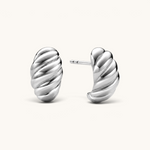 Nadare Co. Romi Earrings featuring a chunky, sculptural twisted design in polished silver-tone stainless steel.