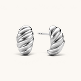 Nadare Co. Romi Earrings featuring a chunky, sculptural twisted design in polished silver-tone stainless steel.