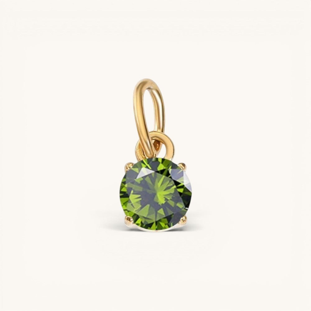 Nadare Co. round birthstone charm in 14k gold plated stainless steel with a sparkling olive green cubic zirconia