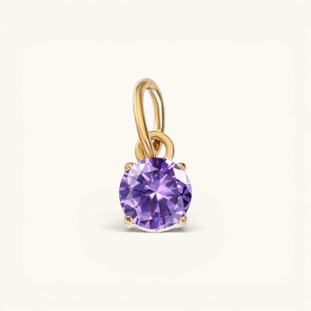 Nadare Co. round purple cubic zirconia birthstone charm in 14k gold plated stainless steel for necklace layering.