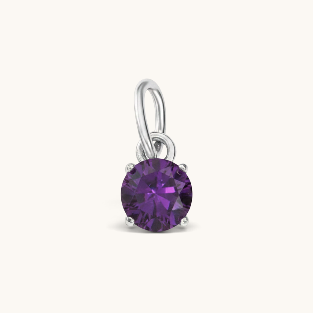 Nadare Co. round purple cubic zirconia birthstone charm in silver-tone setting for necklace layering.