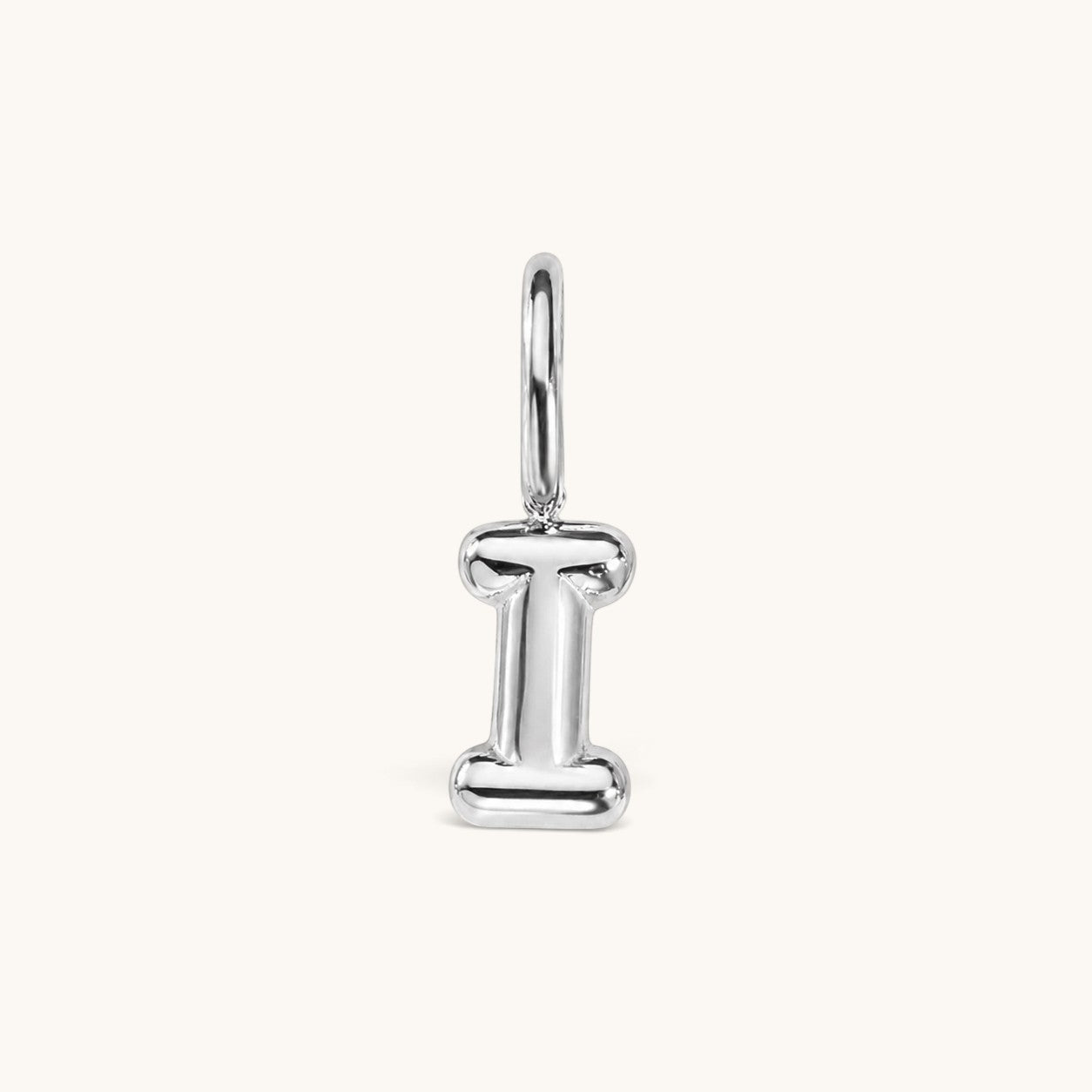 Nadare Co. silver bubble initial charm in the shape of the letter I with a playful, puffed design.
