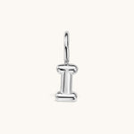 Nadare Co. silver bubble initial charm in the shape of the letter I with a playful, puffed design.