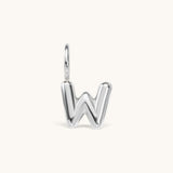 Nadare Co. silver bubble initial charm in the shape of the letter W with a puffed, rounded design.