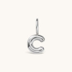 Nadare Co. silver bubble initial charm in the shape of the letter C with a puffed, rounded design.