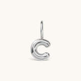 Nadare Co. silver bubble initial charm in the shape of the letter C with a puffed, rounded design.