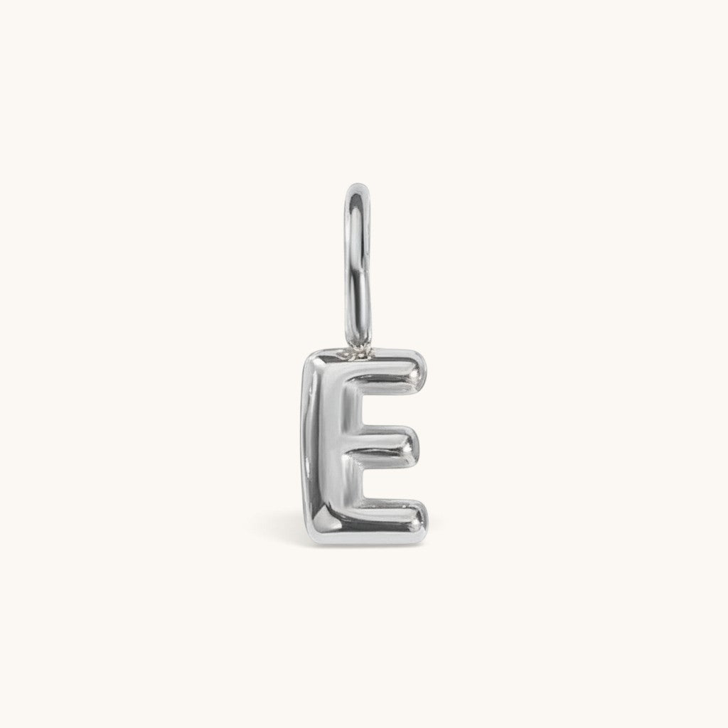 Nadare Co. silver bubble initial charm in the shape of the letter E with a puffed, rounded design.