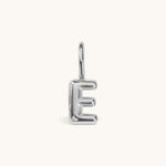 Nadare Co. silver bubble initial charm in the shape of the letter E with a puffed, rounded design.