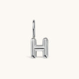 Nadare Co. silver-toned bubble initial charm in the shape of the letter H with a rounded, puffed design.