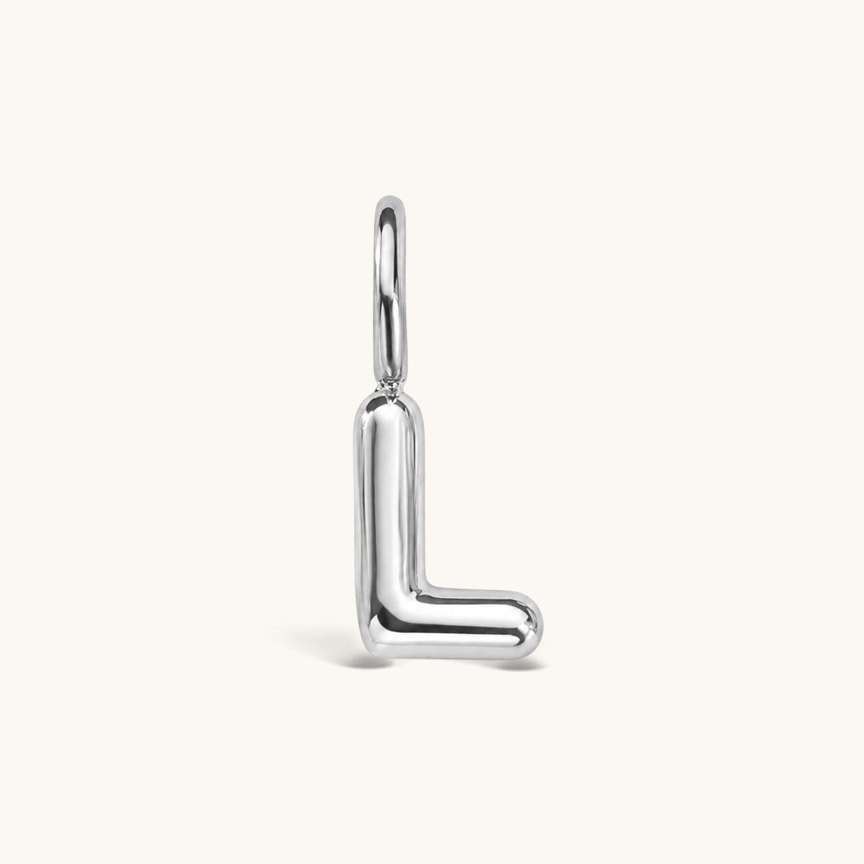 Nadare Co. silver bubble initial charm in the shape of the letter L with a smooth, puffed, rounded design.