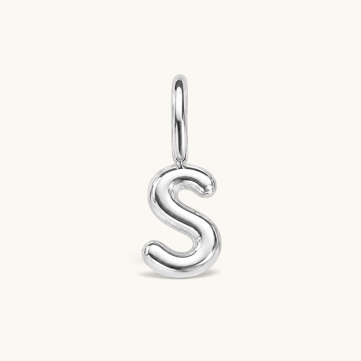 Nadare Co. silver bubble initial charm in the shape of the letter S with a rounded, puffed design.